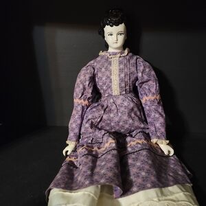 Vintage Porcelain Doll in Purple Dress